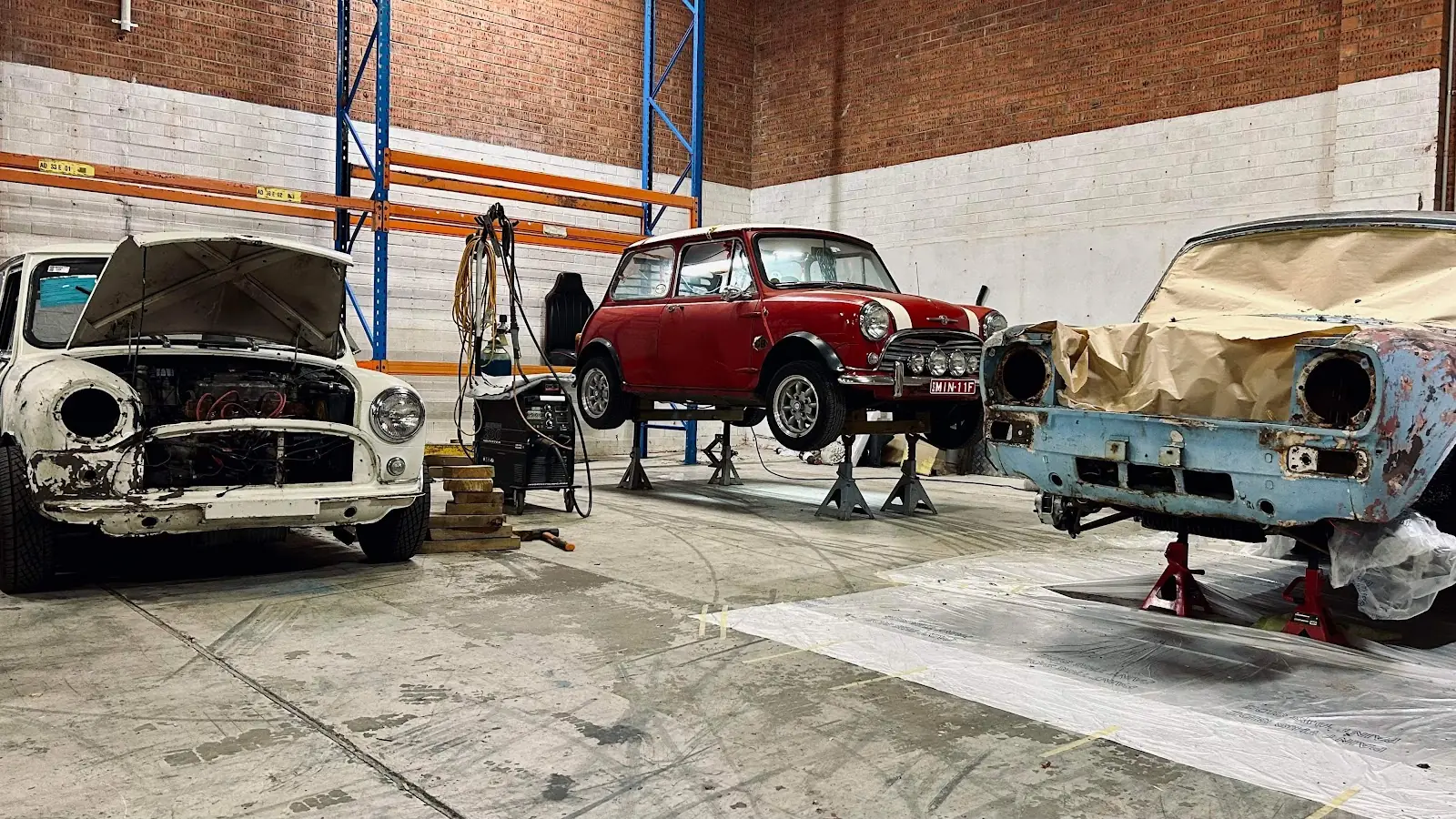 FilAus Prestige workshop floor with cars being restored